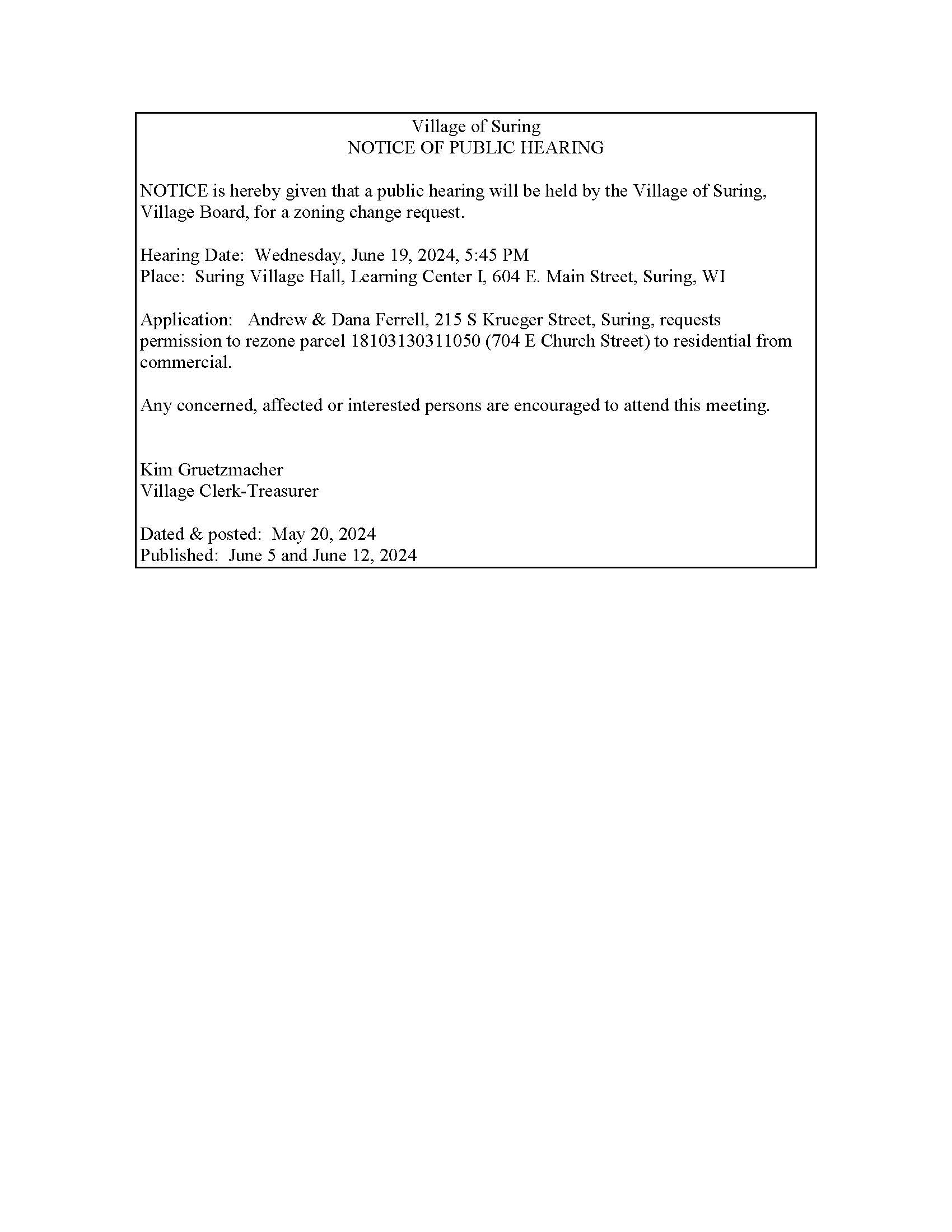 This document is a public hearing notice from the Village of Suring, Wisconsin, regarding a zoning change request by Andrew and Dana Ferrell to rezone a parcel from commercial to residential.