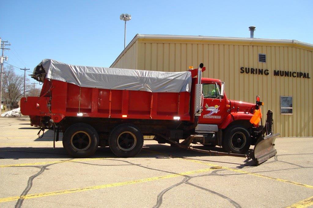 Mack snow plow with a salt spreader
