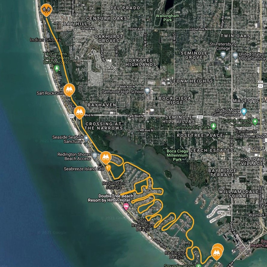 Satellite map with neighborhood labels and restaurant icons along Gulf Blvd near Redington Beach and Indian Shores.