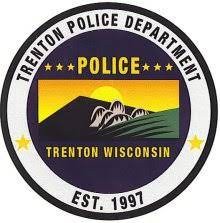 Circular badge: “TRENTON POLICE DEPARTMENT,” “TRENTON WISCONSIN,” mountain landscape, and “EST. 1997.”
